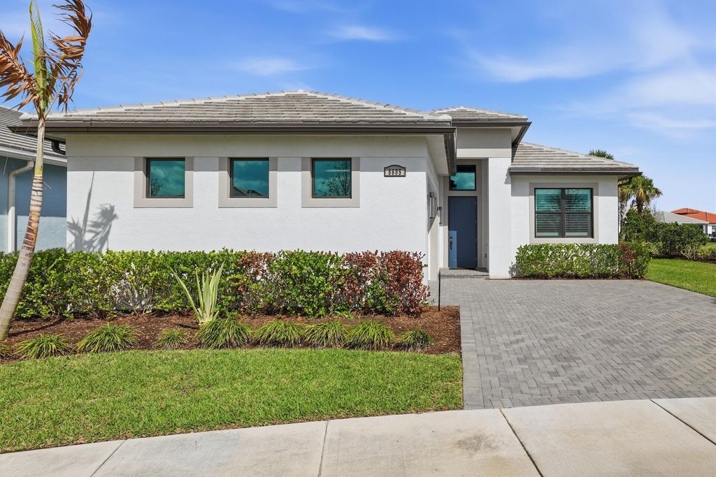 Photo of 8695 SW Cantante Way, Port Saint Lucie, FL 34987 (MLS # B26005141)