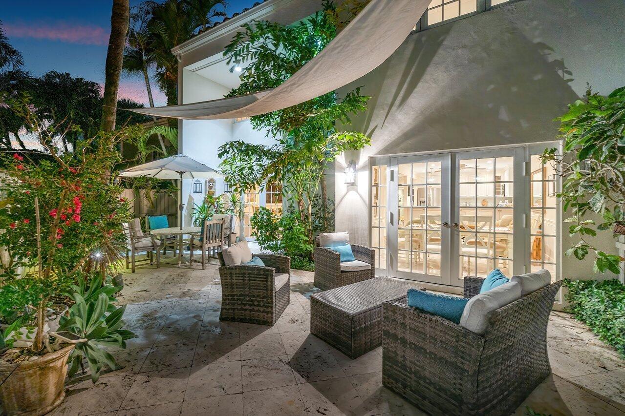 Steps From The Ocean! This 2-story townhome in the intimate Wexford Court beachside community offers the ultimate coastal living experience. Completely updated in 2013, this hidden gem boasts deeded beach access & a pool in a 7-unit gated complex. Features include a custom kitchen with quartz countertops and quality appliances, a private gated courtyard, and impact windows on the second floor. Upstairs, enjoy spacious living with a loft and two master suites, one with balcony access. Washer/dryer located in garage. Outside, relax in the private courtyard oasis with tropical landscaping. Don't miss out on this opportunity for a peaceful coastal lifestyle! Call for updated features and easy showing.