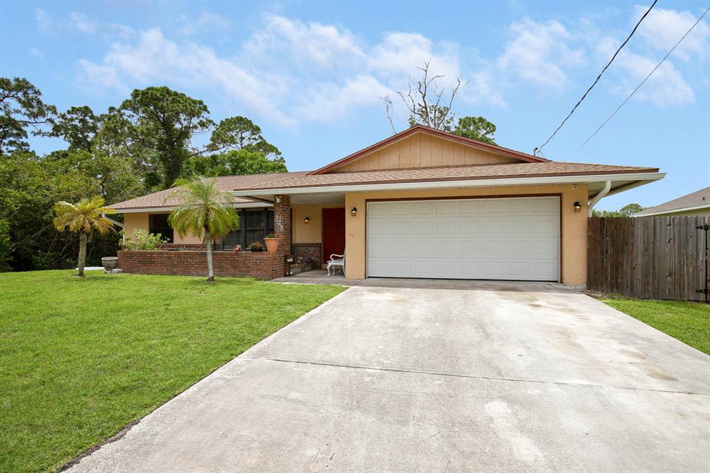 Photo of 1722 SW Bonfire Terrace, Port Saint Lucie, FL 34953 (MLS # R10711835)
