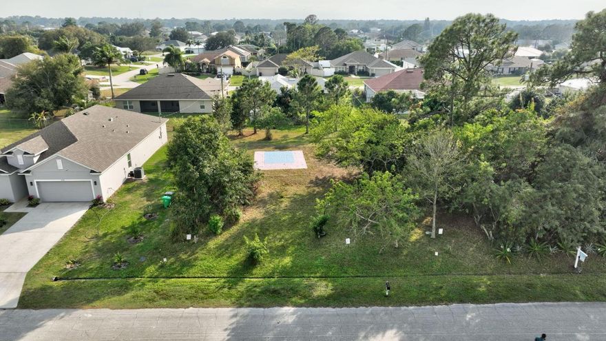 Great opportunity to build your dream home on this cleared lot in a quiet, low-traffic, paved road location. Close to shopping, I-95, and the Florida Turnpike. The previous owner began new construction but did not complete it, giving your plans a head start. Perfect for a peaceful yet convenient lifestyle.