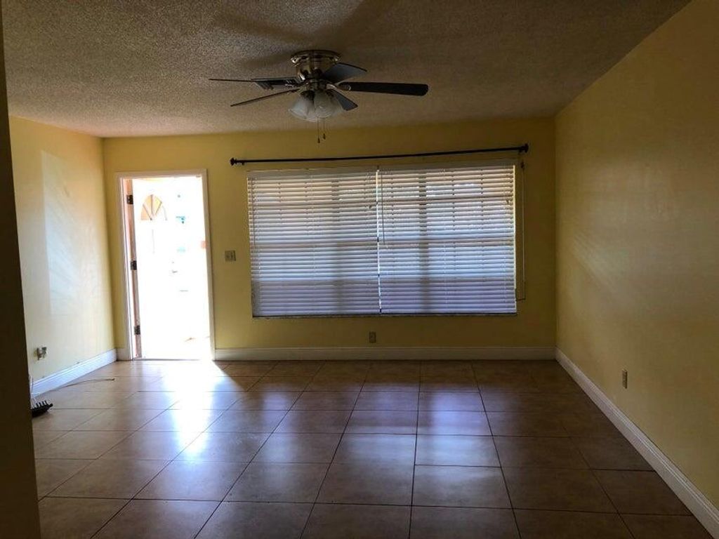 Photo of 325 NE Orchard Street, Port Saint Lucie, FL 34983 (MLS # R11028573)