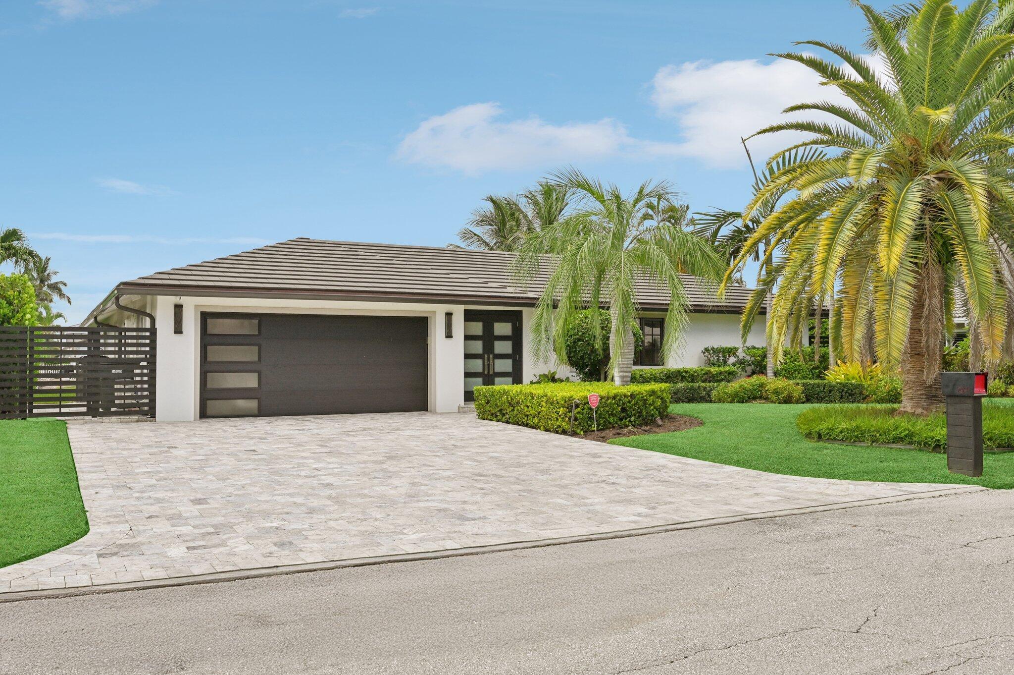 A private boater's retreat in Boca Raton's Bel Marra waterfront community. Situated on a navigable wide canal with direct ocean access, this beautifully maintained 3 bedroom, 2 bath single family residence offers the perfect blend of privacy, comfort & premium waterfront living. Surrounded by lush tropical landscaping, the home's private outdoor oasis features a saltwater pool, multiple seating areas, and tranquil water views--ideal for both relaxation and entertaining. For boating enthusiasts, this property is a rare find: equipped with an elevator boat lift rated up to 16,000 lbs, complete with water and electric at the dock. Built for peace of mind, the home includes impact glass throughout, a whole-house generator, and a 2018 roof for lasting durability. Inside, you'll find defined and