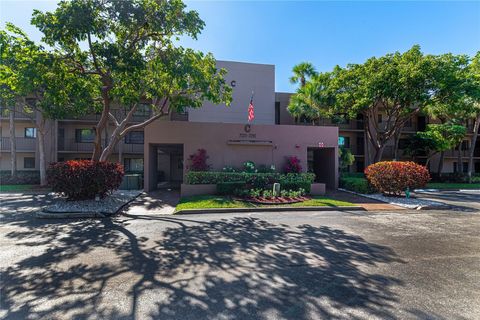 Photo of 7247 Ashmont Cir #7247, Tamarac, FL 33321 (MLS # F10533048)