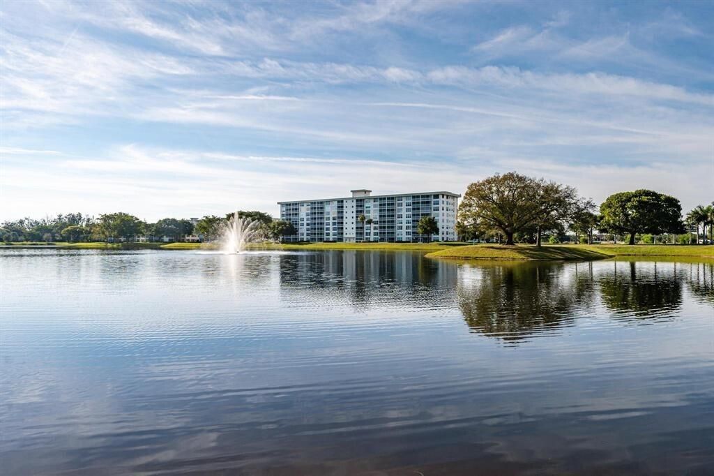 Photo of 3091 N Course Drive #303, Pompano Beach, FL 33069 (MLS # B26011932)