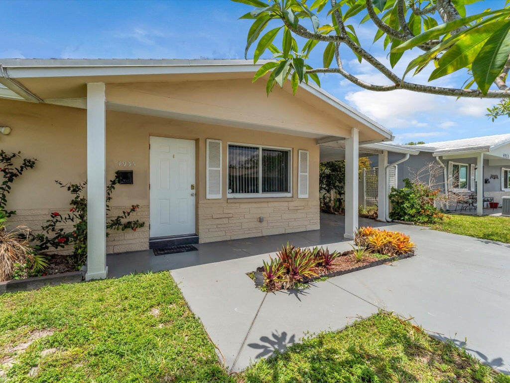 Photo of 4935 NW 54th Street, Tamarac, FL 33319 (MLS # B26039046)