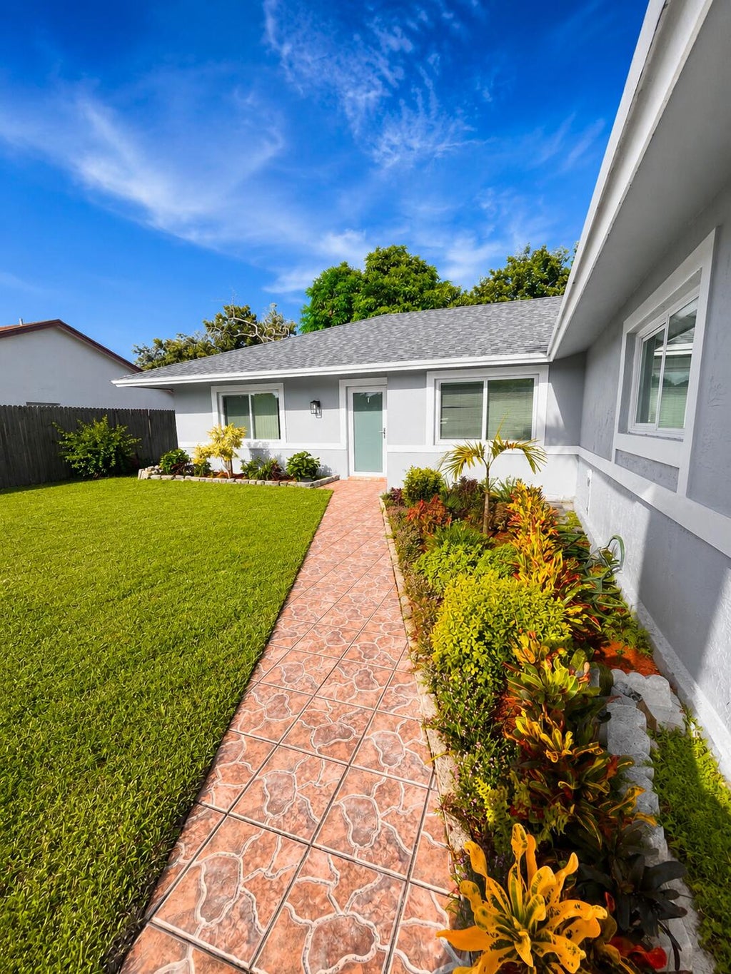 Photo of 7434 Thatcher Avenue, Lake Worth, FL 33462 (MLS # B26044837)
