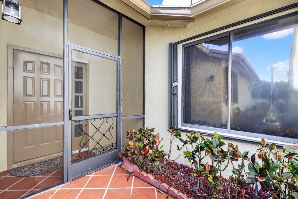 Photo of 870 NW 32nd Avenue, Delray Beach, FL 33445 (MLS # B26008925)