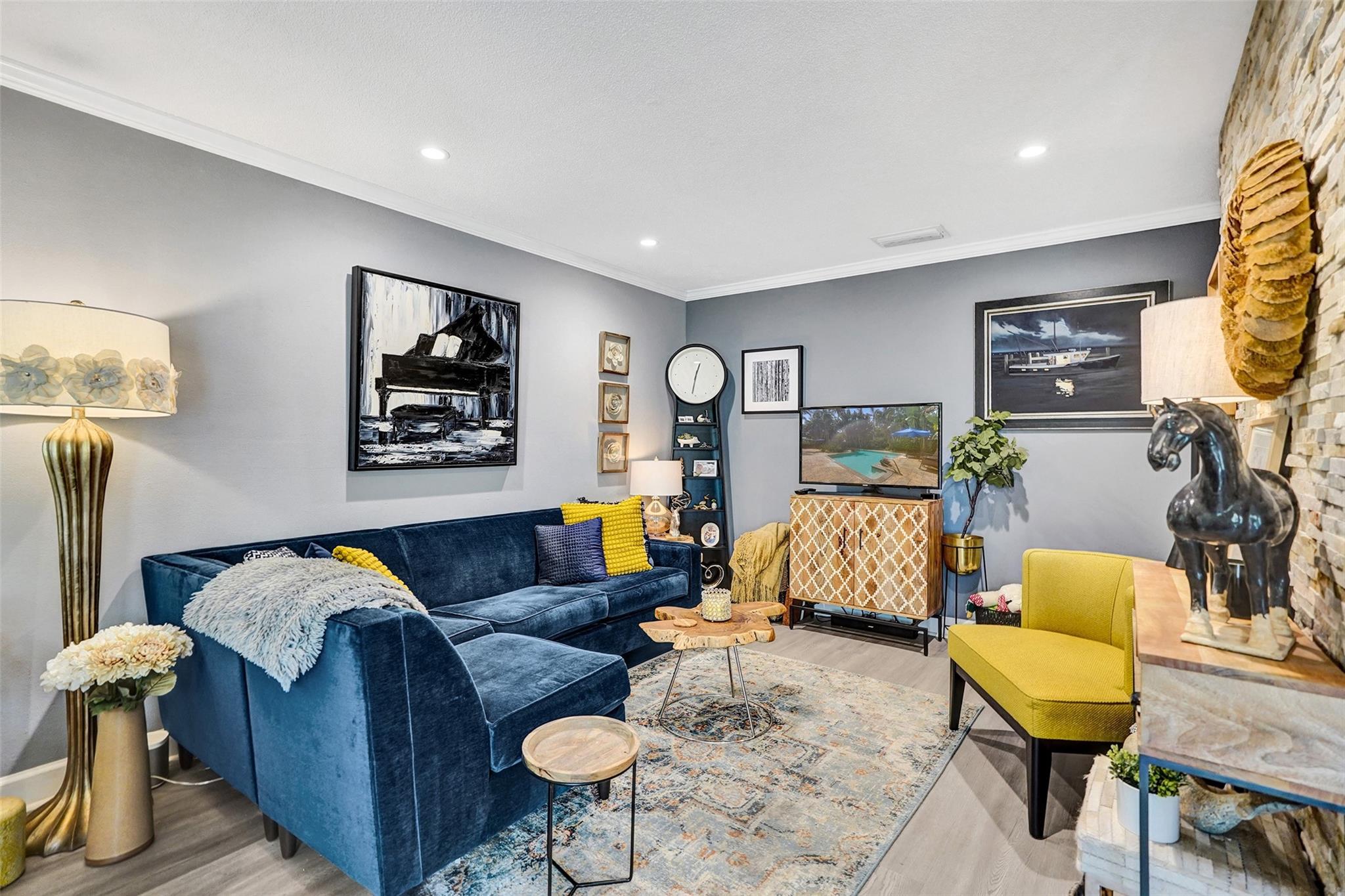 Completely Renovated Condo with Modern Kitchen and Bath being sold turn key including high end furniture. Newer A/C & tankless water heater, updated electrical, custom lighting, luxury flooring, impact windows, and plantation shutters. Kitchen features quartz counters, subway backsplash, stainless appliances, farm sink, and desk nook. In unit washer & dryer! Great location in Middle River. This private key west style community is just South of Wilton and convenient to Flagler Village, Las Olas, and Downtown. Gated community, heated pool, pet friendly, guest parking, and annual rentals OK. Call today for more info.