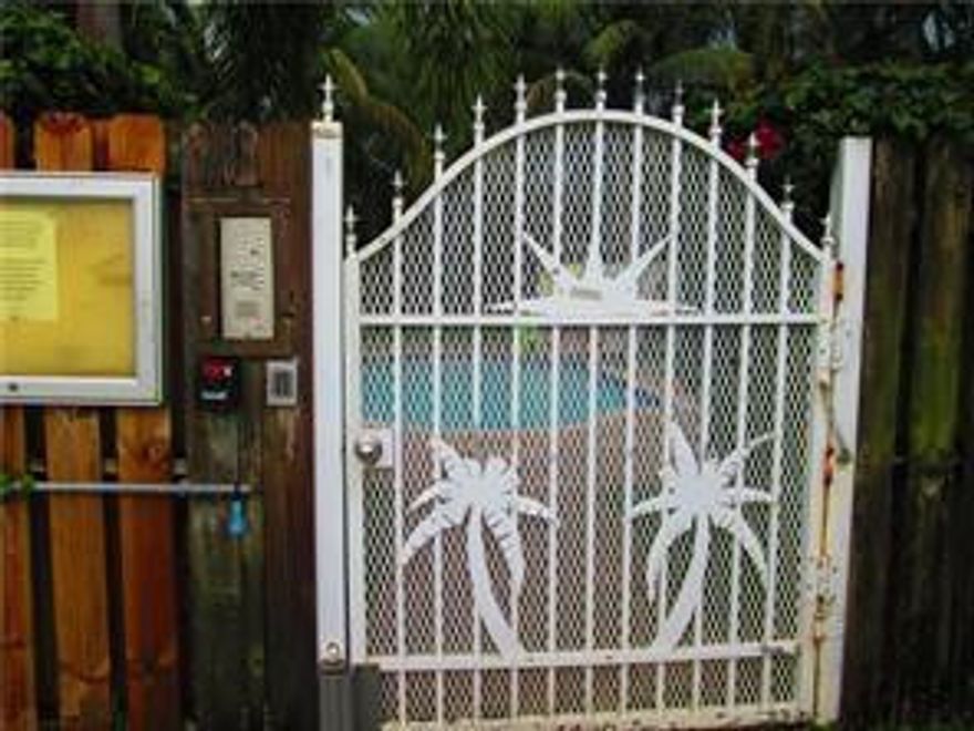 Stylish 2/1 condo rental in popular secure pool complex seconds from Wilton Manors nightlife and minutes to downtown and the beach! This corner unit with impact glass offers both a front and rear private courtyard, spacious living/dining area, marble floors, newer upgraded st steel appliances, maple cabinets and granite counters. On site laundry and pets considered with deposit.