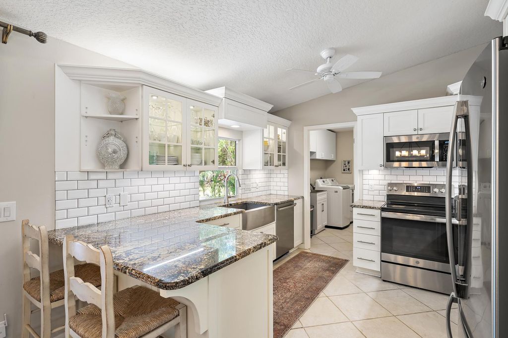 Photo of 13323 N 164th Ct Court N, Jupiter, FL 33478 (MLS # B26008597)