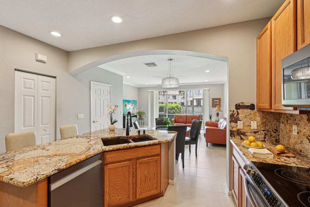 Photo of 9070 Tremezzo Lane, Boynton Beach, FL 33472 (MLS # B26017658)