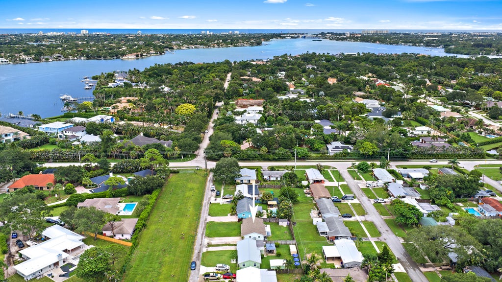Photo of 5810 Tucker Road, Jupiter, FL 33458 (MLS # B26071835)