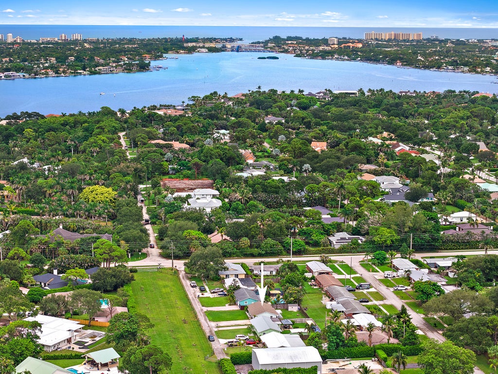 Photo of 5810 Tucker Road, Jupiter, FL 33458 (MLS # B26071835)