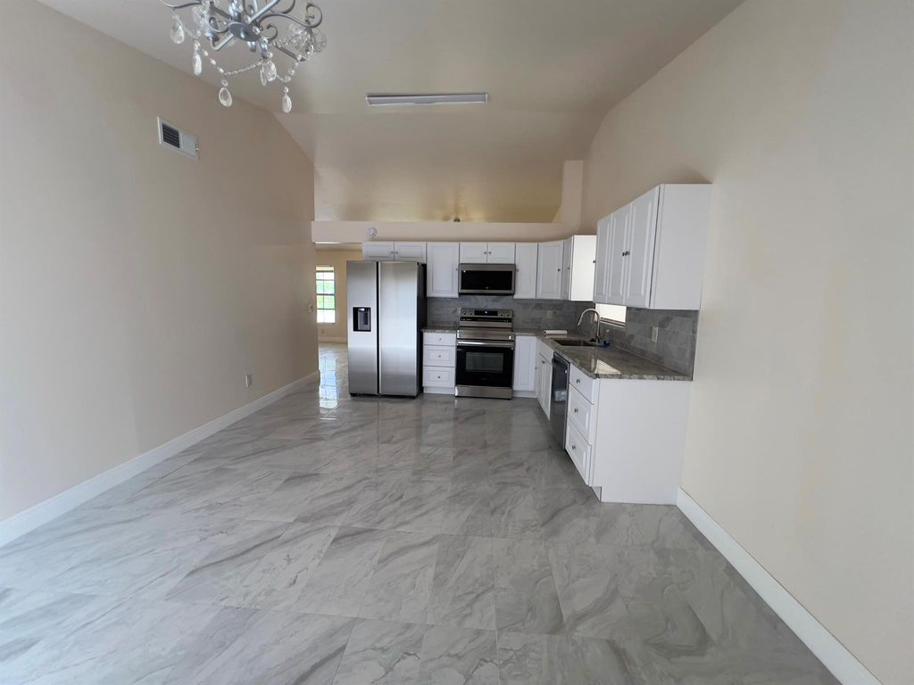 Photo of 7926 Burlwood Lane, Lake Worth, FL 33467 (MLS # R11122634)