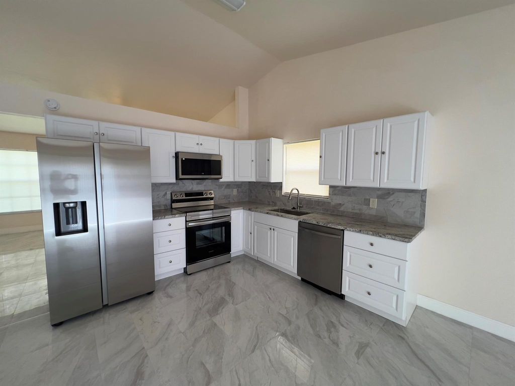 Photo of 7926 Burlwood Lane, Lake Worth, FL 33467 (MLS # R11122634)