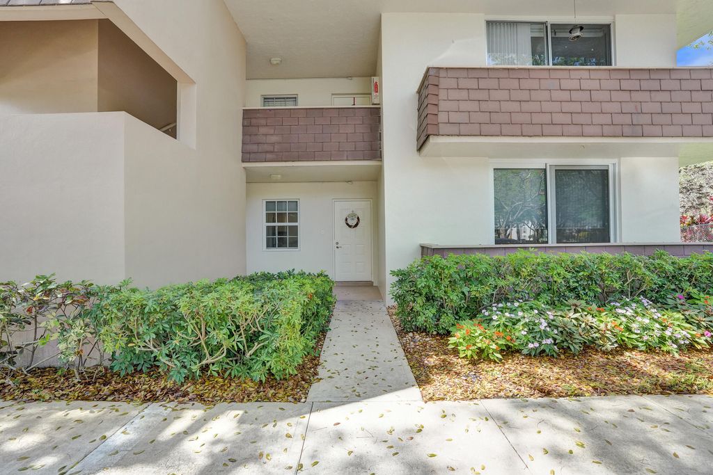 Photo of 3621 Oaks Clubhouse Drive #101, Pompano Beach, FL 33069 (MLS # B26025827)