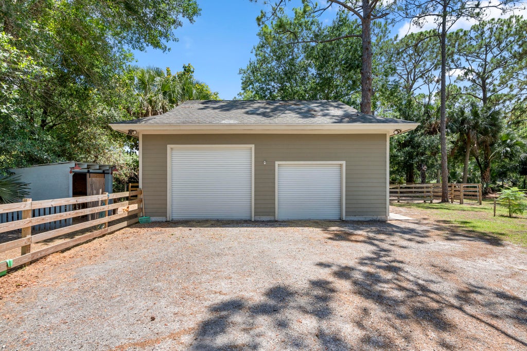 Photo of 10786 165th Road N, Jupiter, FL 33478 (MLS # R10991111)