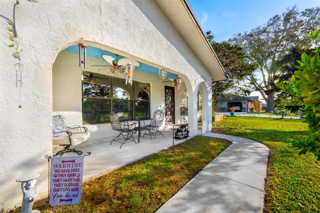 Photo of 1949 SE Cheltenham Street, Port Saint Lucie, FL 34983 (MLS # R10938691)