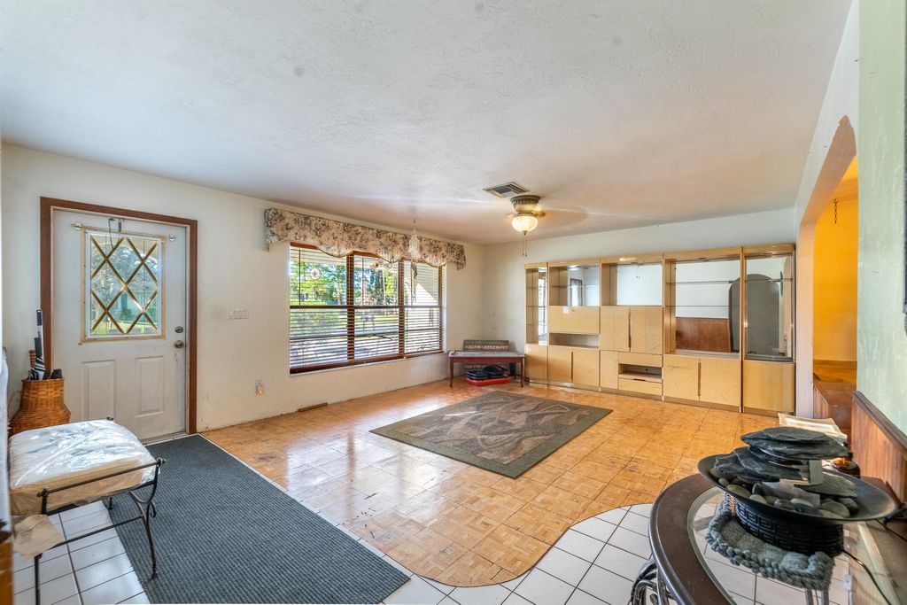 Photo of 1949 SE Cheltenham Street, Port Saint Lucie, FL 34983 (MLS # R10938691)