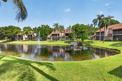 Photo of 5731 Coach House Circle #A, Boca Raton, FL 33486 (MLS # B26088293)
