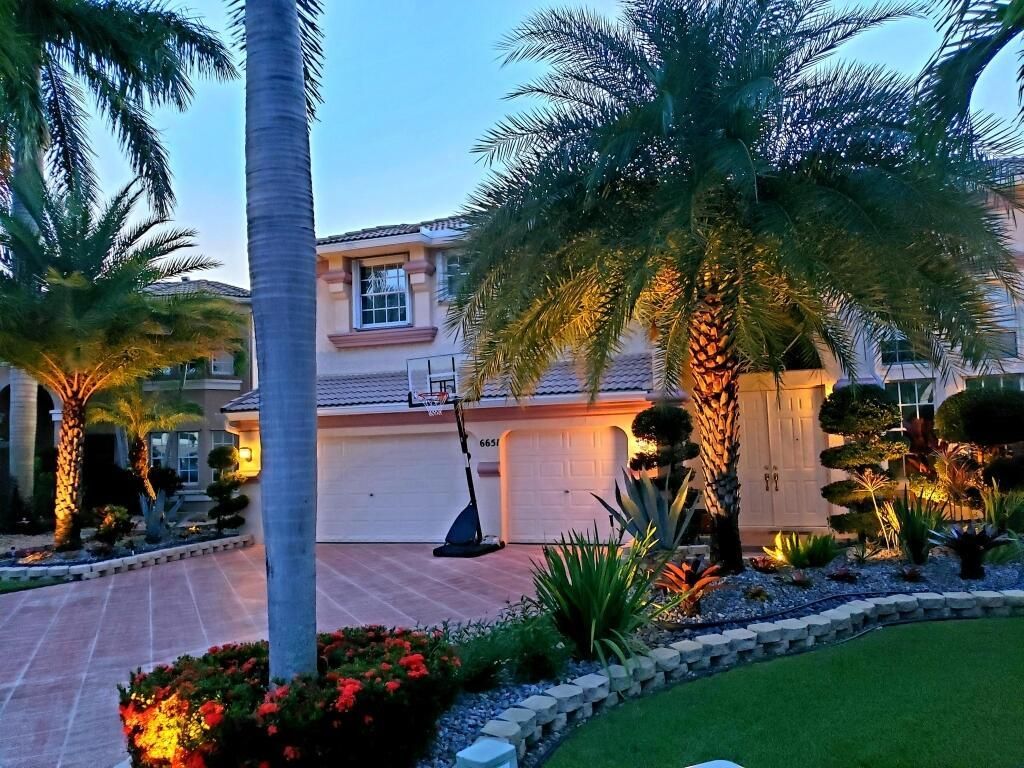 Photo of 6651 Marbletree Lane Ln, Lake Worth, FL 33467 (MLS # R10751922)