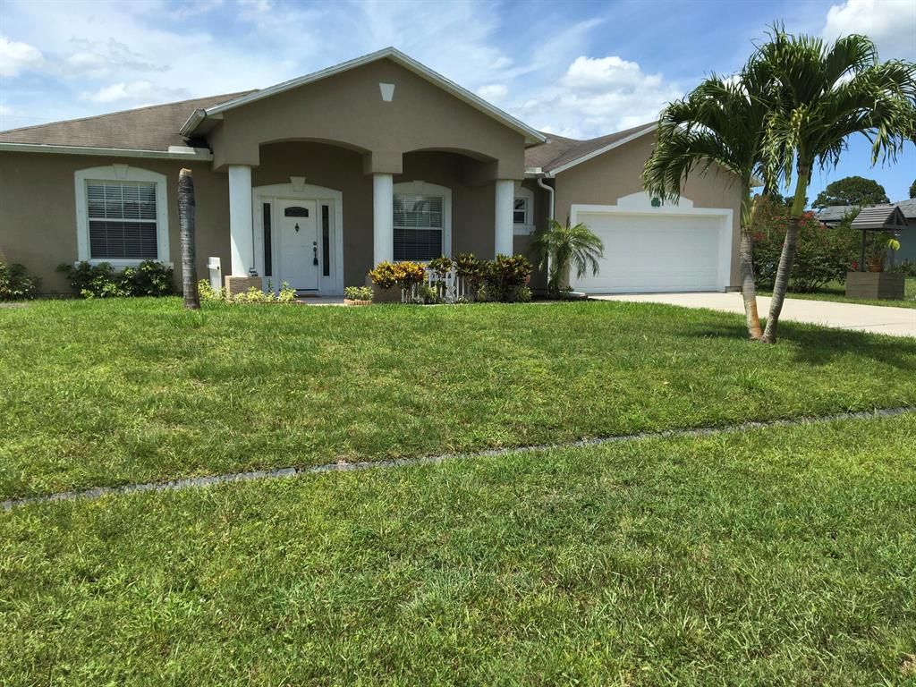 Photo of 771 SE Elwood Avenue, Port Saint Lucie, FL 34983 (MLS # R10724404)