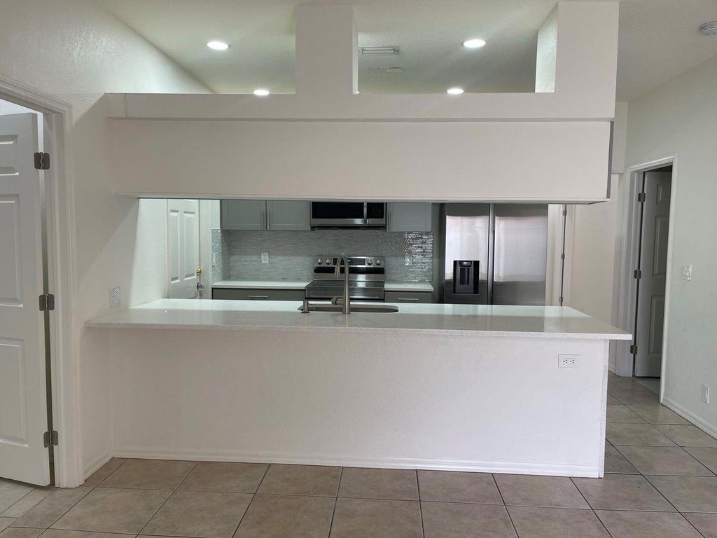 Photo of 1084 Crassula Court #D, Wellington, FL 33414 (MLS # R11114427)