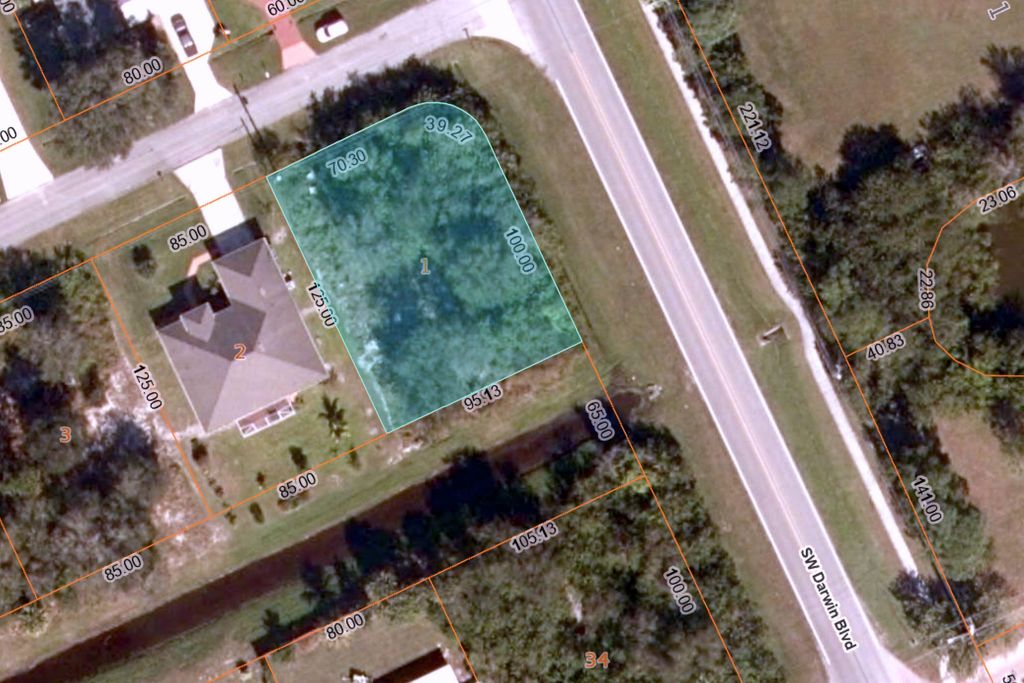 Photo of 3702 SW Darwin Boulevard, Port Saint Lucie, FL 34953 (MLS # R11167583)