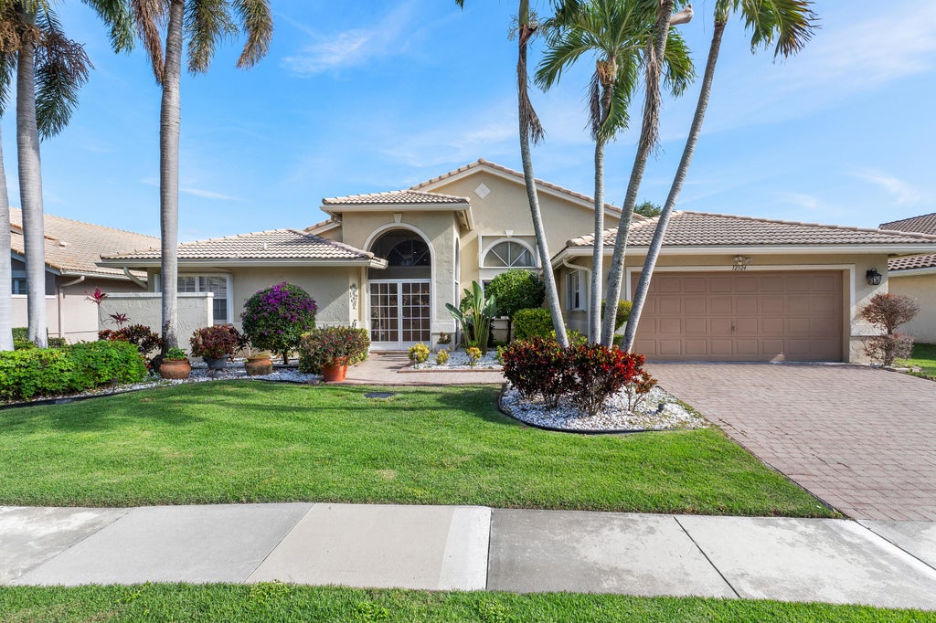 Photo of 12324 Lakeridge Falls Drive, Boynton Beach, FL 33437 (MLS # R11048491)