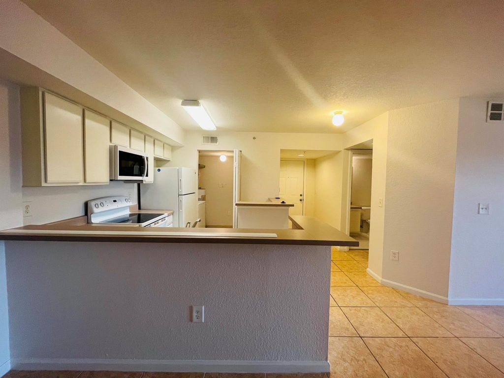 Photo of 171 SW Palm Drive #206, Port Saint Lucie, FL 34986 (MLS # R11050012)