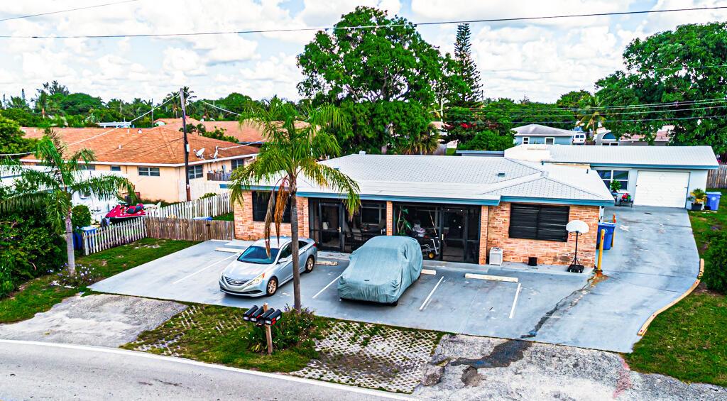 Great 4 Unit property for investor. Totally rented 4 plex in a great location in Lantana. Units are a 1/1, 2/1, 3/1 and an efficiency. Lots of upgrades. Coin Laundry on site with $2500-$3000 additional income per year. Spacious backyard for barbecuing, etc. This property is .09 miles to the beach. Also, many restaurants, shopping, etc., in the area. DRIVE BY ONLY, PLEASE DO NOT DISTURB TENANTS!Lantana is a very up and coming area with an influx of new enterprises into this area with expectations to significantly bolster strong appreciation on real estate values in the future!