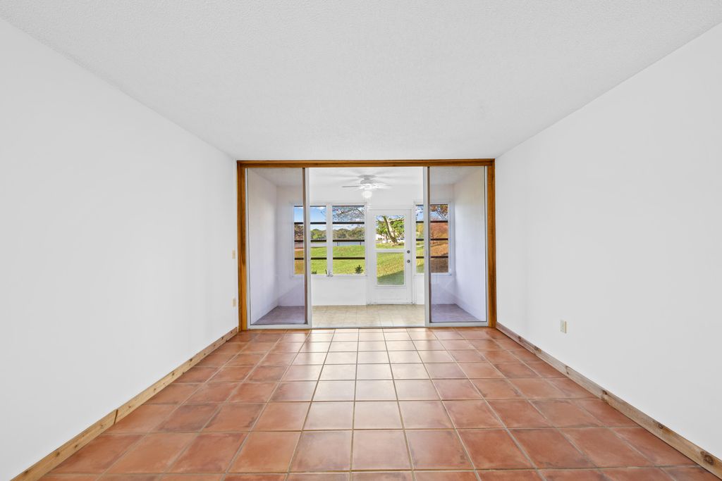 Photo of 9480 Tangerine Place #102, Davie, FL 33324 (MLS # B26006921)