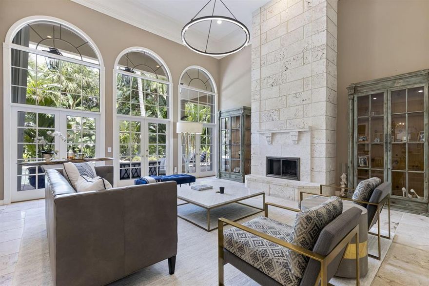 This stunning Polo Club estate is situated on just under 1/2 an acre and offers a private, waterfront location overlooking the Dunes Preserve. The beautiful open floor plan home is just under 5,000 sq ft of living space with 5 bedrooms, 5 full and one half baths, 3-car garage, grandiose pool, office, conference room. Thoughtfully designed, this luxury built home features a completely customized floor plan with tons of upgrades throughout. The main floor is host to the exquisite master wing, 2 large walk-in closets, a stunning bathroom with center Jacuzzi tub, adjacent to the master is the secluded office or conference room.  The chef's kitchen is equipped with a center cook-island, Induction stove. There is also a separate, large dining room.