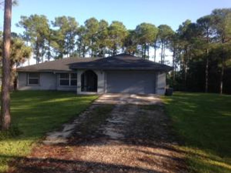 Looking for a home you can put your stamp of approval on?  This is it...nestled quietly in the acreage. This lovely 3 bedroom home with beautifully remodeled bathrooms. Offers plenty of space with a formal living and formal dining room, breakfast area and family room.  Covered patio, large yard with storage shed and 2 car garage.