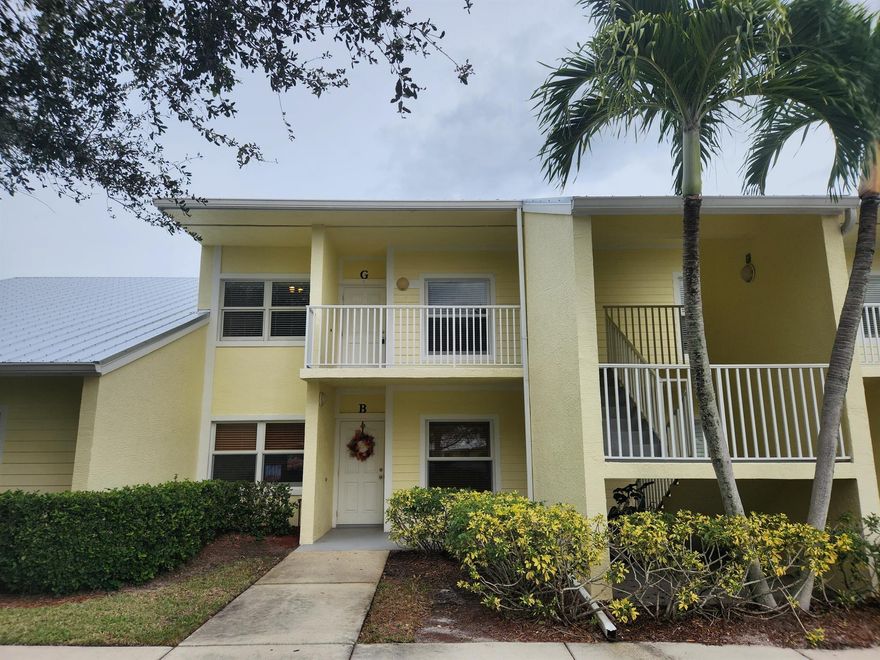 Take a look at this lovely spacious upstairs condo 2 bedrooms, 2 bathrooms with new luxury vinyl flooring and fresh paint.  Vaulted ceilings, new flooring, walk-in closet, impact glass and TV & Internet included!  Full-sized washer & dryer. Wonderful golf and lake views from the screened-in back poch w storage room, watch beautiful sunrises and golfers as well as nature. This condo is within walking distance of the clubhouse and community pool.  Clubhouse is open every day for lunch and the community pool is open to all owners and tenants.  Gator Trace with its 18-hole Arthur Hills designed challenging golf course which is open to the public as well as Memberships available. Conveniently located to shopping, restaurants, churches, beaches and commuting.