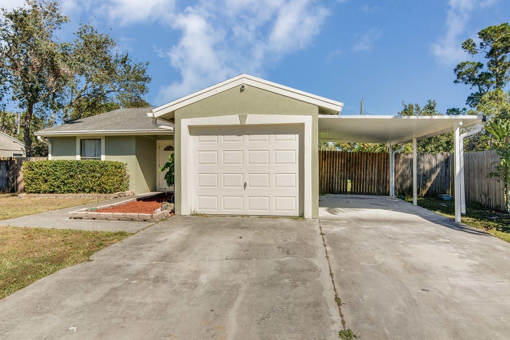 This bright, modern, and airy updated charmer is close to more fun activities in West Palm Beach than we can name. Water parks, world-class golf, professional baseball, hiking, paddle boarding and we're just getting started!!!!Walking into the open concept living room you immediately feel the sense of space with the vaulted ceilings and ample natural light. Everything in this home has been carefully updated, upgraded, and improved. The beautiful kitchen walks out to the expanded living space of a backyard patio thru the gorgeous french doors, perfect for outdoor dining and entertaining!