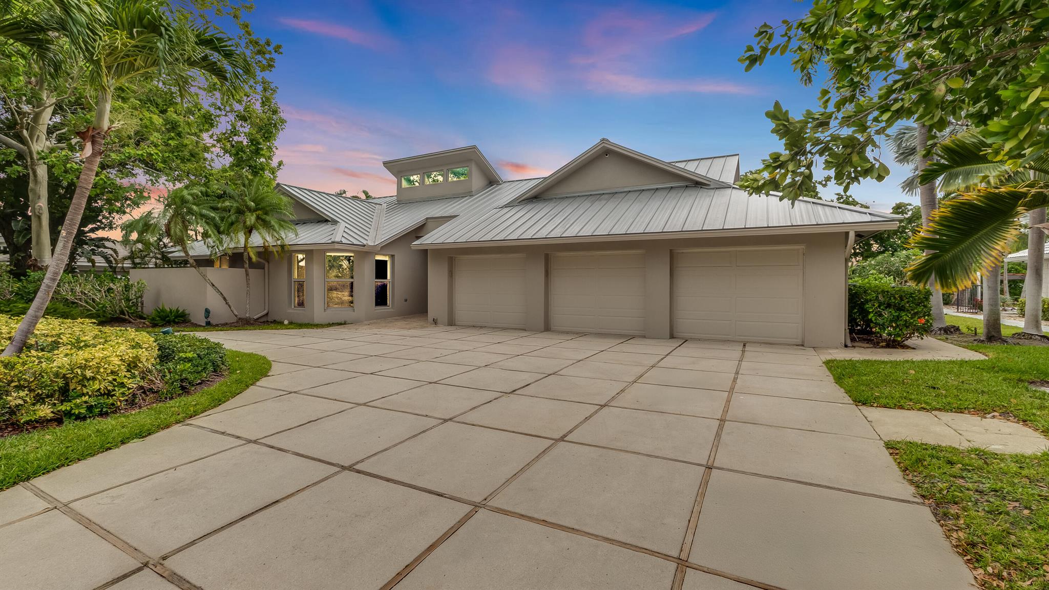This is your chance to own a beautifully renovated residence in Boca Bath & Tennis Club, one of Boca Raton's most sought-after gated communities, known for its prime central location and exceptional lifestyle. No expense was spared in the complete renovation of this impressive 6-bedroom, 6.5-bath home, which features a brand-new contemporary kitchen and stunning new bathrooms throughout. The thoughtfully designed floor plan offers an open-concept layout while still maintaining clearly defined spaces, creating the ideal balance for both entertaining and everyday living. As you enter through the foyer, you're welcomed into a spacious, light filled living room with expansive views of the travertine patio, sparkling pool, and the oversized backyard with no rear neighbors.