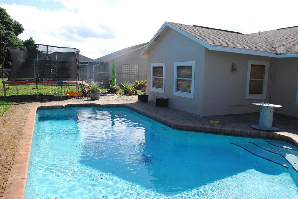 Photo of 3749 SW Jack Street, Port Saint Lucie, FL 34953 (MLS # R10753899)