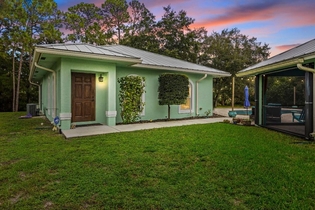 Photo of 6434 Mandarin Boulevard, The Acreage, FL 33470 (MLS # R11122359)