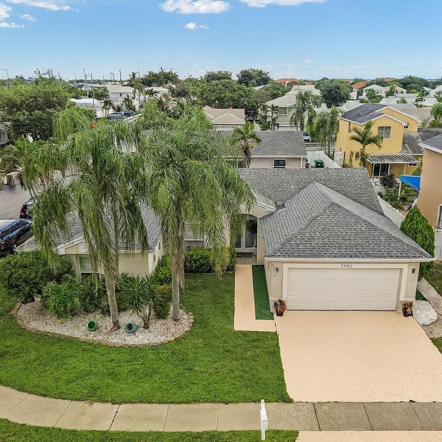 Welcome to this spacious 3-bedroom, 2-bath single-family home in the heart of Davie! Offering 1,986 sq. ft. of living space, this residence features an open layout with tile flooring throughout, a bright and inviting interior, and plenty of room to entertain. The kitchen flows seamlessly into the living and dining areas, creating a comfortable space for everyday living. Enjoy a private lot of 7,173 sq. ft. with both a carport and attached garage providing parking for 2 vehicles. Built in 1992 with masonry construction and stucco exterior, the home is solid and well-maintained. The community offers additional convenience with an HOA of just $210/month.