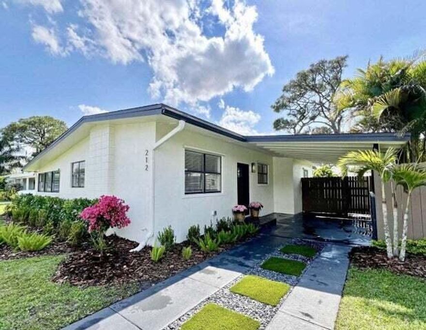 This beautifully renovated 3-bedroom, 2-bath home is perfect for families! Enjoy a spacious Florida room, large fenced backyard, and a new kitchen with stainless steel appliances. Fresh paint and new laminate flooring create a bright, welcoming feel throughout. Located in a quiet neighborhood just minutes from parks, beaches, and shopping. A must-see for anyone looking for comfort, style, and convenience!