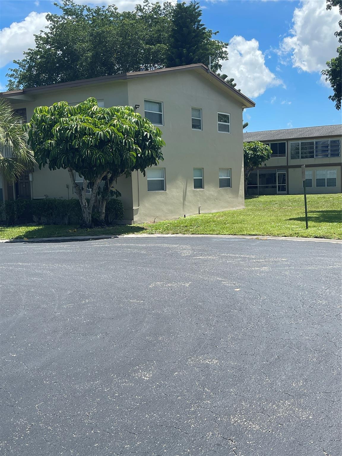 Great Condo located on the corner , on CUL DE SAC and first floor ,light and bright unit, 55+ Community, located close to a popular shopping center, public transportation, Banks and Restaurants, just 10 miles from Pompano Beach ,not on main road but easy access within the community and buildings ,split floor plan giving to everyone privacy, open patio with an easy access to the living room, no children under 18, no rentals, no pets, 700 minimum credit score for all applicants, pre-approval for financed purchases , 20% down payment is required , A/C replaced in 2019, additional exterior storage ,low maintenance fee, , All information is deemed accurate but not guaranteed, buyer and buyer's agent are encouraged to verify all details and perform their own due diligence.