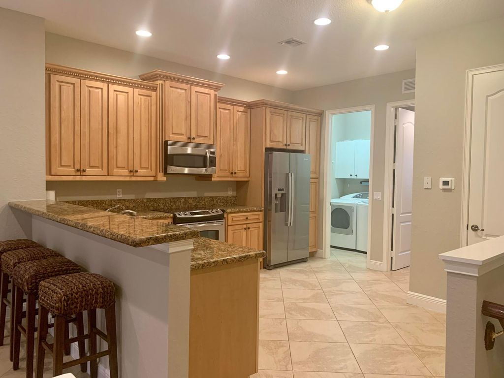 Photo of 4805 Sawgrass Breeze Drive, Palm Beach Gardens, FL 33418 (MLS # R11154025)