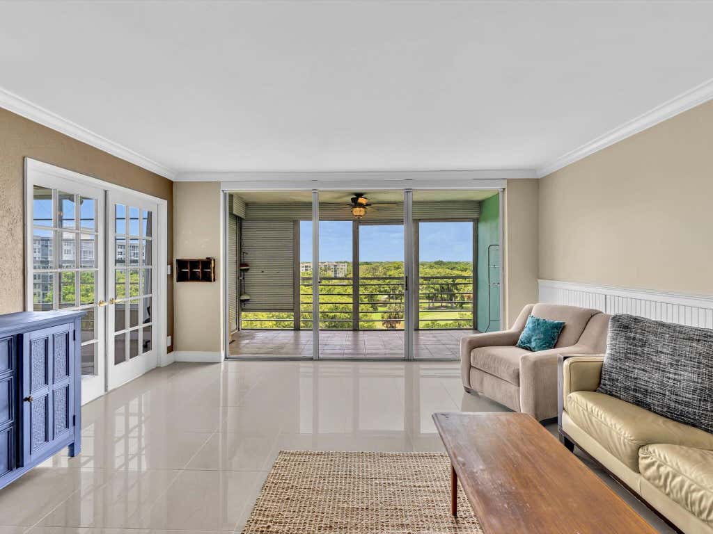 Photo of 605 OAKS Drive #810, Pompano Beach, FL 33069 (MLS # B26057956)