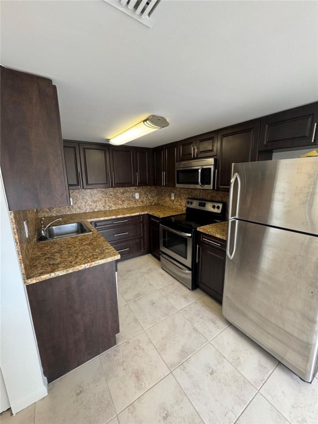 Photo of 1025 SW 112 Te Ter #1025, Pembroke Pines, FL 33025 (MLS # F10469052)
