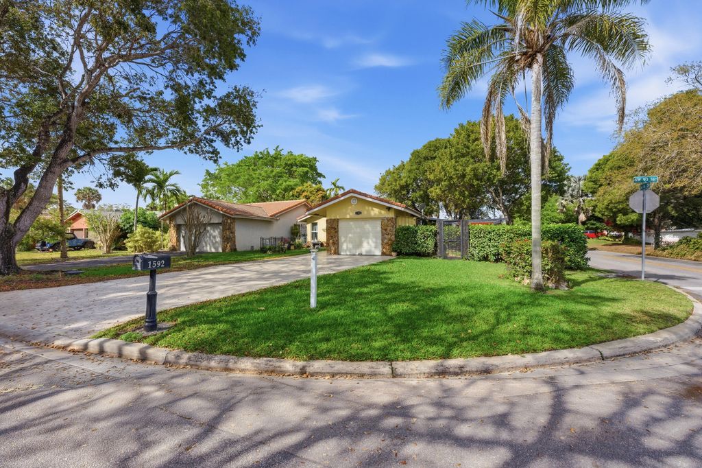 Photo of 1592 NW 93rd Ter, Coral Springs, FL 33071 (MLS # B26000417)