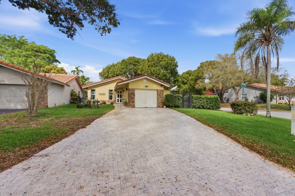 Photo of 1592 NW 93rd Ter, Coral Springs, FL 33071 (MLS # B26000417)