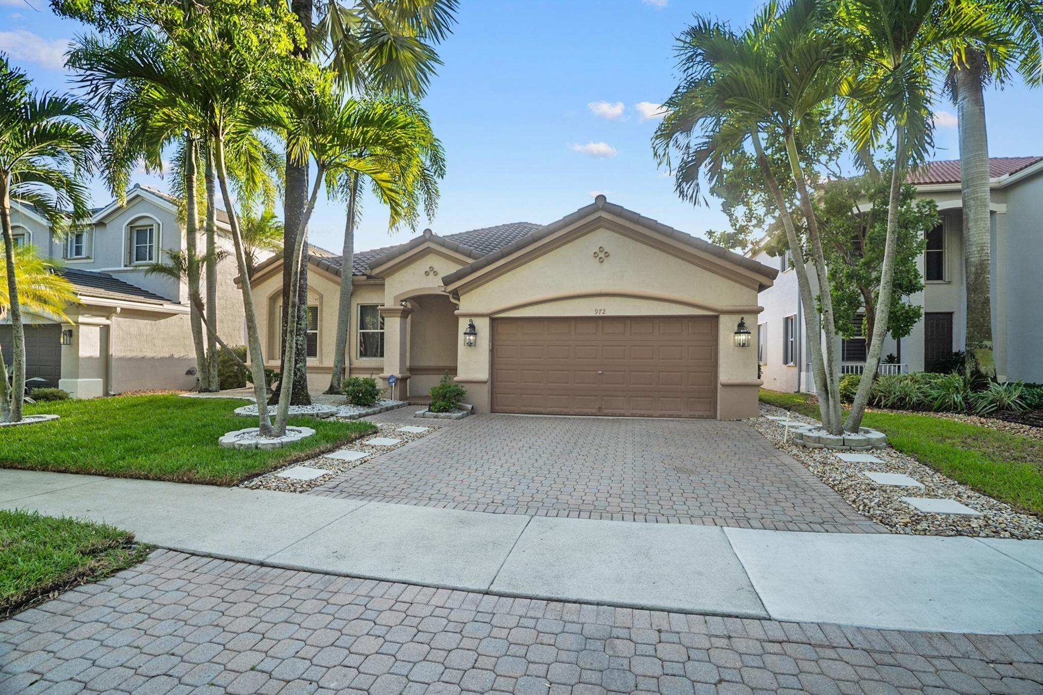 BEAUTIFUL 4 BED, 2 BATH HOME IN THE PRESTIGIOUS GATED COMMUNITY OF SAVANNA, WESTON, ENJOY STUNNING SUNSETS WITH PRESERVE VIEWS FROM YOUR BACKYARD THROUGH ELEGANT FRENCHDOORS, OPEN KITCHEN WITH 42'' MAPLE WOOD CABINETS, SURROUND SOUND THROUGHOUT PERFECT FOR ENTERTAINMENT AND RELAXATION, HUNTER DOUGLAS SHADES, AND A SPACIOUS LAUNDRY ROOM, MASTER SUITE WITH SIITING AREA, ROOF 2019, A/C 2020, POOL REFRESHED IN 2024, TOP RATED SCHOOLS AND RESORT STYLE LIVING CLUB HOUSE WITH OLIMPIC-SIZE SWIMMING POOL ALSO HAS A SPLASH POOL FOR KIDS WITH SPRINKLERS. IT ALSO INCLUDES MINI GOLF COURSE,BBQ AREA, MINI SCCOCER FIELD , BASKETBALL COURT AND PLAYGROUND FOR CHILODREN .DON'T MISS THIS OPPORTUNITY!!! CALL NOW FOR YOUR TOUR.