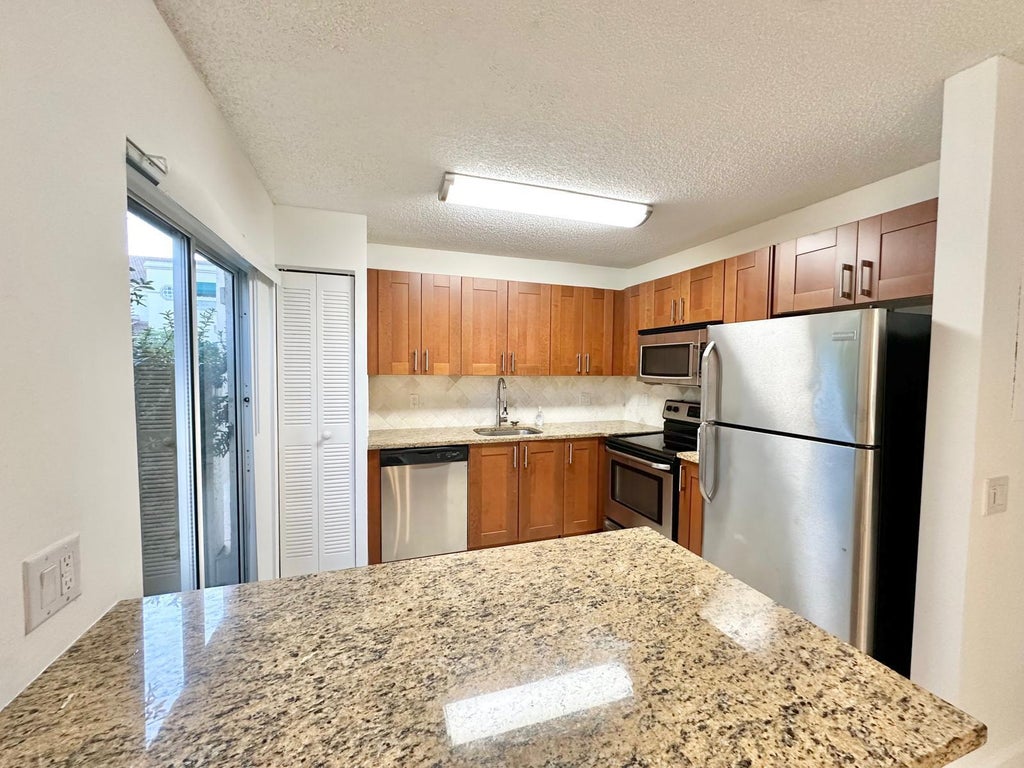 Photo of 6646 Via Regina, Boca Raton, FL 33433 (MLS # R11071445)