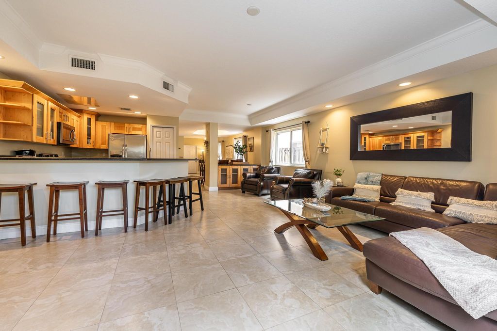 Photo of 1721 SW 23rd Street #1721, Fort Lauderdale, FL 33315 (MLS # B26031906)